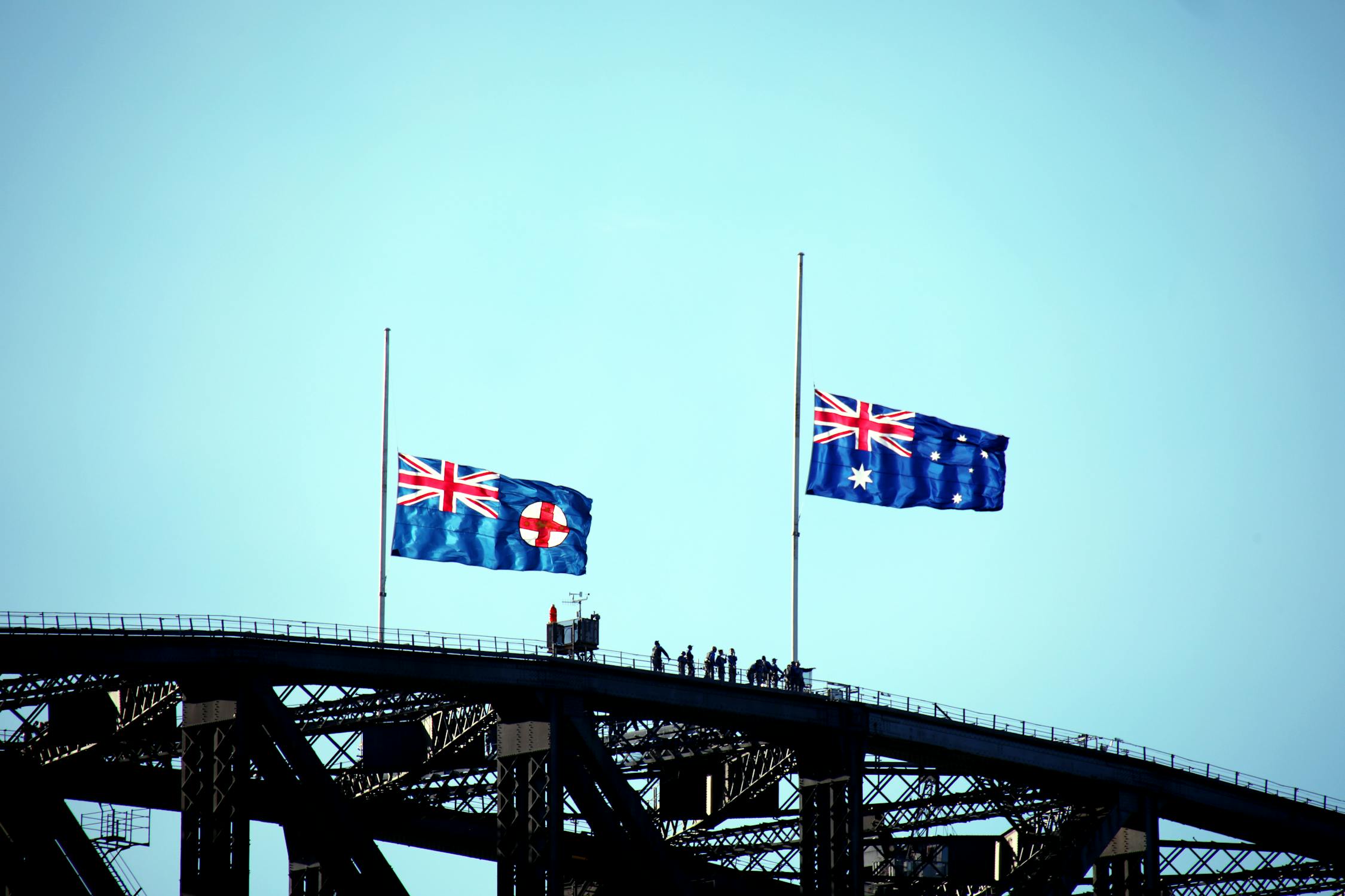 free-photo-of-sydney-harbour-bridge-with-australian-flags